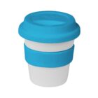 A reusable coffee cup with a white body, featuring a blue silicone sleeve and a blue lid, placed against a plain white background.