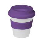 A reusable cup with a white body and purple silicone lid and band, designed to resemble a standard coffee cup. The lid and band provide grip and insulation, while the minimalist design focuses on functionality and style.