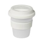 A white reusable cup with a lid, designed for hot beverages. The cup has a slightly textured, matte finish and a minimalist design featuring a flat lid and a central band for grip.