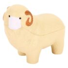 A small, cute toy ram with tan wool and curved brown horns is wearing a white face mask. The background is plain white.