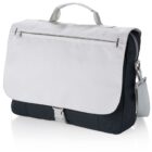 A two-tone messenger bag with a white flap and a black body. It features a front zipper pocket on the flap, a top handle, and an adjustable shoulder strap. The bag has a sleek and modern design, resting on a reflective surface.