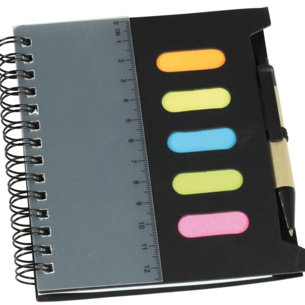 A spiral-bound notebook with a black cover, featuring four colorful sticky notes in orange, blue, yellow, and pink. A ruler is printed on the covers edge. A pen is attached to a holder on the right side.