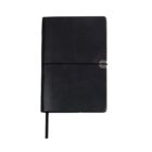 A black leather-bound notebook with an elastic strap closure and a page marker ribbon. The cover appears smooth and sleek, designed for professional or personal use. The notebook is closed and set against a white background.