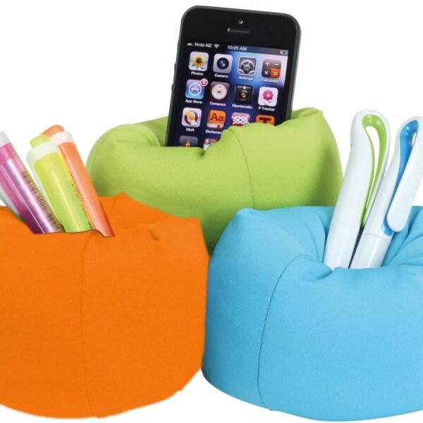 Three bean bag-style holders: an orange one with colorful pens, a green one with a smartphone in it, and a blue one containing markers.