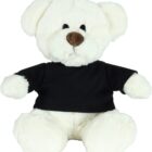 A fluffy white teddy bear wearing a black T-shirt sits upright. Its ears are round, and it has a brown nose with black eyes, giving it a friendly appearance. The plush toy is isolated on a white background.