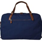 A blue duffle bag with brown leather handles and a shoulder strap. It features a front zipper pocket and a main zippered compartment.