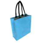 A glossy light blue tote bag with long black handles, standing upright. The interior is ivory, contrasting with the shiny exterior. The bags simple, sleek design suggests it is suitable for various uses.