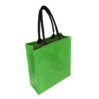 A shiny, bright green tote bag with black handles. The bag has a structured rectangular shape and a glossy finish, standing upright against a white background.
