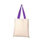 A beige canvas tote bag with vibrant purple handles, hanging on a white background.