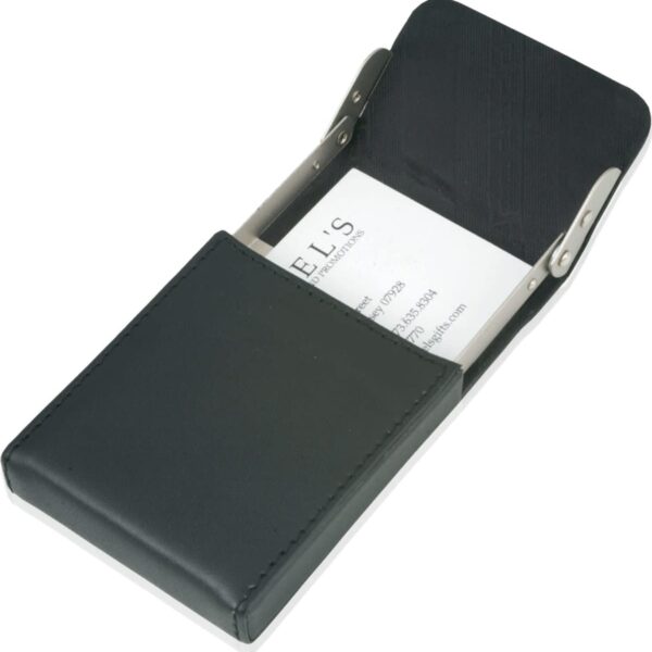 A black leather business card holder slightly open, revealing a stack of business cards inside. The holder has a sleek, rectangular design with metallic hinges at the corners. The business cards have printed text visible through the opening.