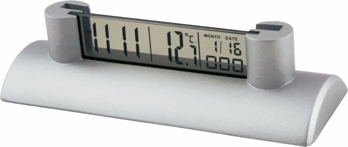 A silver digital clock displaying the time 11:11. The screen also shows the temperature 12°C and the date 11/16. The clock has a modern, curved design with a rectangular digital display.