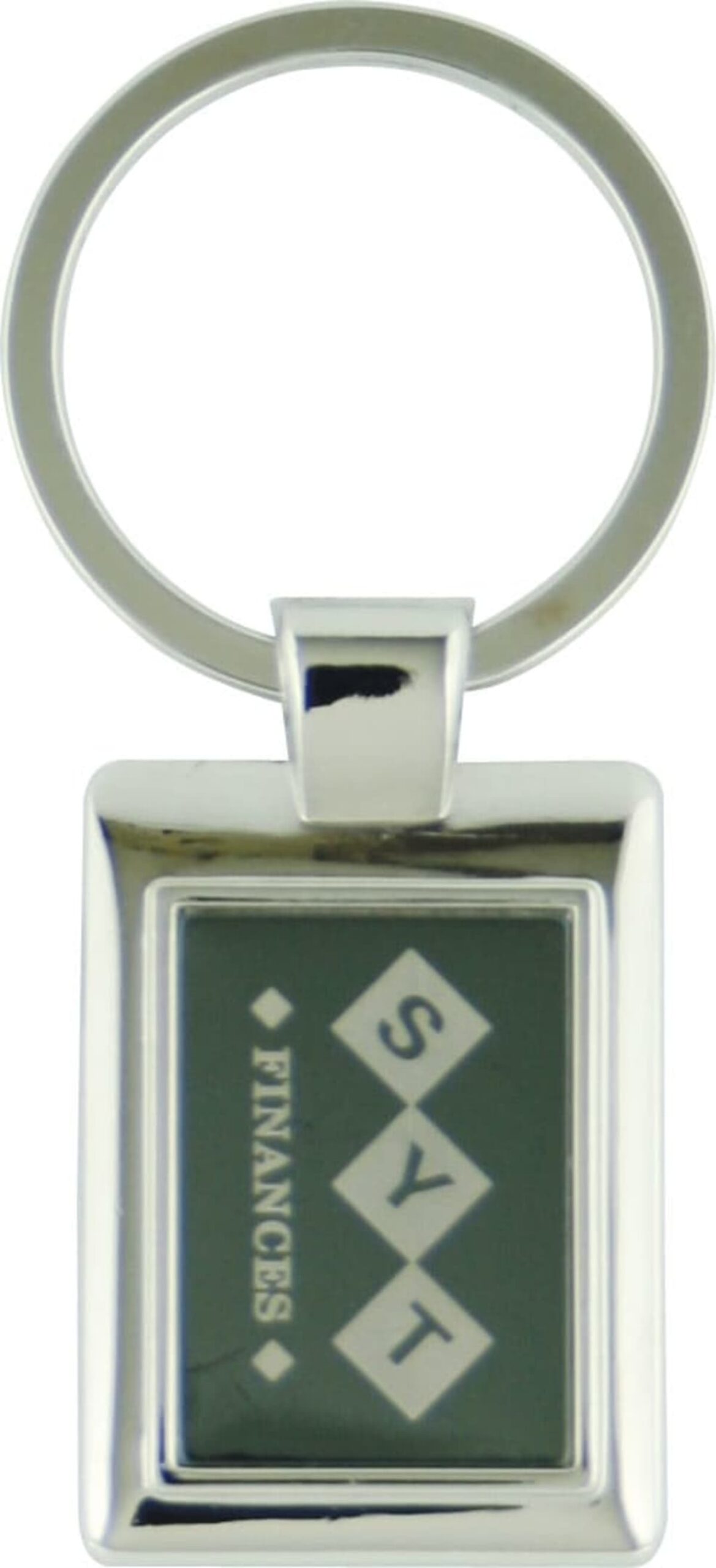 A rectangular keychain with a silver frame and ring, featuring a dark green insert. The insert has the word FINANCES vertically on the left and the letters S Y T inside three diamond shapes arranged diagonally.