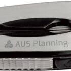 A folded silver multi-tool with the text AUS Planning on its side, featuring multiple tool attachments and a sleek design.