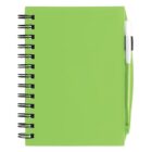 A green spiral-bound notebook with a matching green pen attached to its side. The notebook is closed, showing its cover. The pen is clipped securely, ready for use.