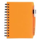 A small orange spiral-bound notebook with a white pen attached to the side. The notebook has a translucent cover and features black spiral binding on the left. The pen has an orange barrel and is held in a black loop.