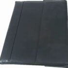 A black leather folder or portfolio, closed and seen from above, with a sleek and minimal design. The stitching is visible along the edges, giving it a polished look.