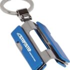 A metal keychain featuring a small blue binder clip attached to a silver keyring, with STEP branding on the clip.