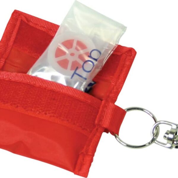 A red fabric pouch with a keychain clip holds a transparent packet containing a circular object. The pouch is open, revealing the contents, and the keychain clip is attached to the pouchs corner.