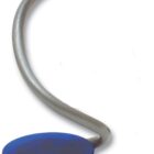 A flexible, metallic arm with an alligator clip at the end, attached to a round, blue plastic base. The base has a silver emblem, and the arm appears to be adjustable, possibly for holding items or displaying notes.