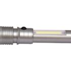 A silver LED flashlight with a textured grip and a side-mounted button. The flashlight has a cylindrical body and an illuminated area on one side.