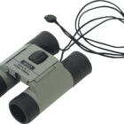 Compact gray binoculars with an 8x21 magnification. They have a black focus knob and eyepieces, with a thin black neck strap attached. The binoculars are folded at the center hinge, resting on a plain surface.
