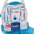 A portable first aid kit with a clear blue case, containing bandages, a pair of scissors, gauze pads, antiseptic wipes, and adhesive strips arranged in compartments. The front features an illustration of a person applying a bandage.