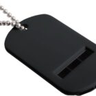 A black guitar pick punch with a dog tag shape attached to a silver ball chain. The punch is used for creating guitar picks from various materials.