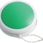 A green and white yo-yo with a string attached, lying on a white background.