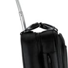 Black rolling suitcase with a retractable silver handle, standing upright. The suitcase features two wheels and multiple zippered compartments, designed for travel convenience.