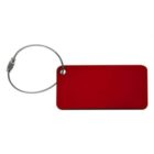 A rectangular, red luggage tag with rounded corners attached to a flexible silver wire loop through a small hole on the left side.