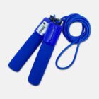 A blue jump rope with soft foam handles is coiled neatly. One handle has a transparent section revealing a built-in digital counter. The design is sleek, with the cord neatly looped and the handles lying side by side.