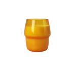 A small, orange glass with a smooth, glossy finish, featuring a curved design around the middle. The glass is set against a plain white background.