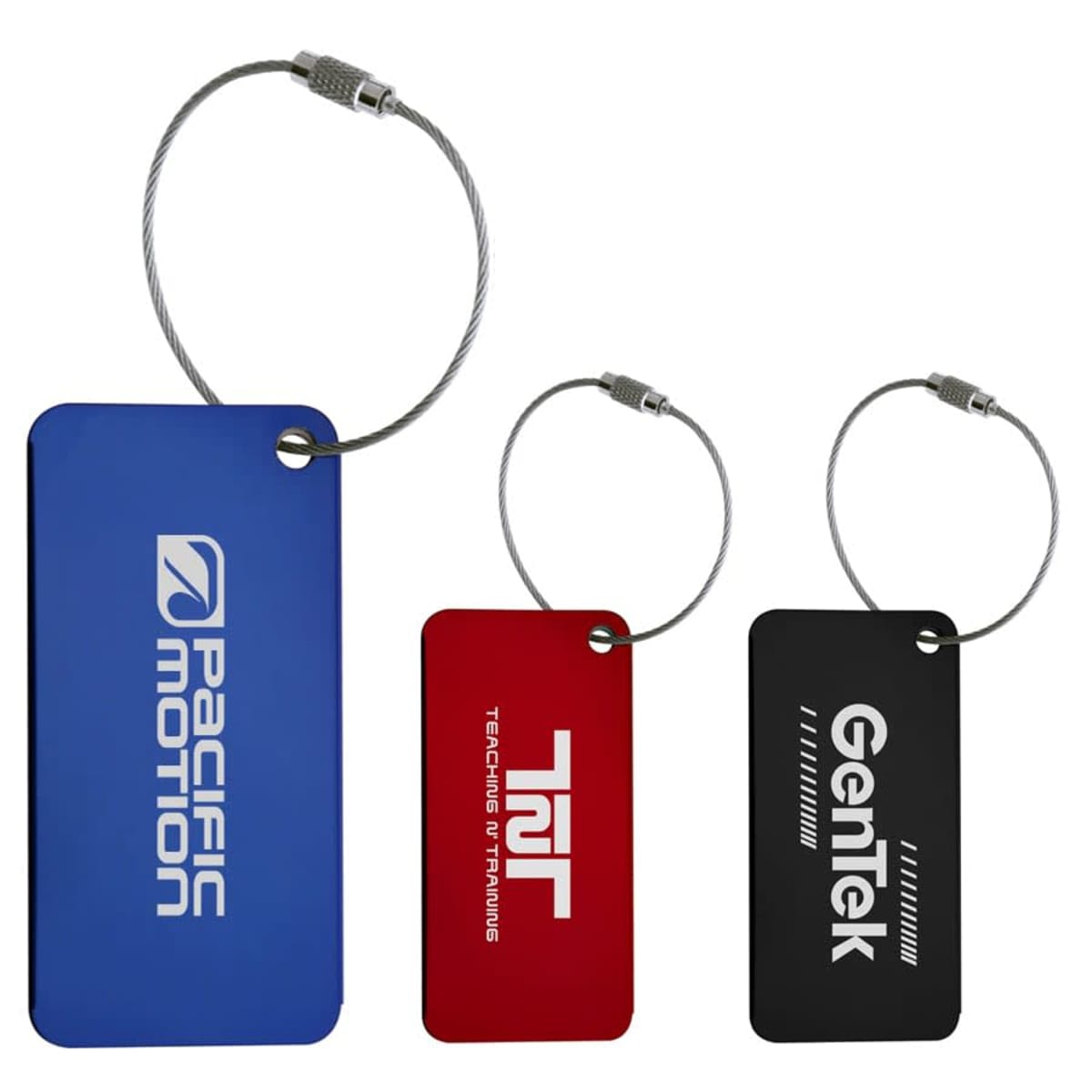 Three rectangular luggage tags are shown. The blue tag reads Pacific Motion, the red tag reads TURN TRENDS IN TRAINING, and the black tag reads GenTek. Each tag has a metal wire loop for attachment.