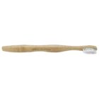A bamboo toothbrush with white bristles. The handle is smooth and features engraved text. The design emphasizes an eco-friendly aesthetic.