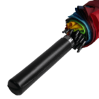 Closed umbrella showing a leather-like handle and folded canopy in rainbow colors, including red, blue, green, and yellow. The ends of the metallic spokes are visible at the top.