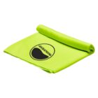 A lime green towel partially rolled up with a black logo featuring a circular design and text in a non-Latin script on the surface.