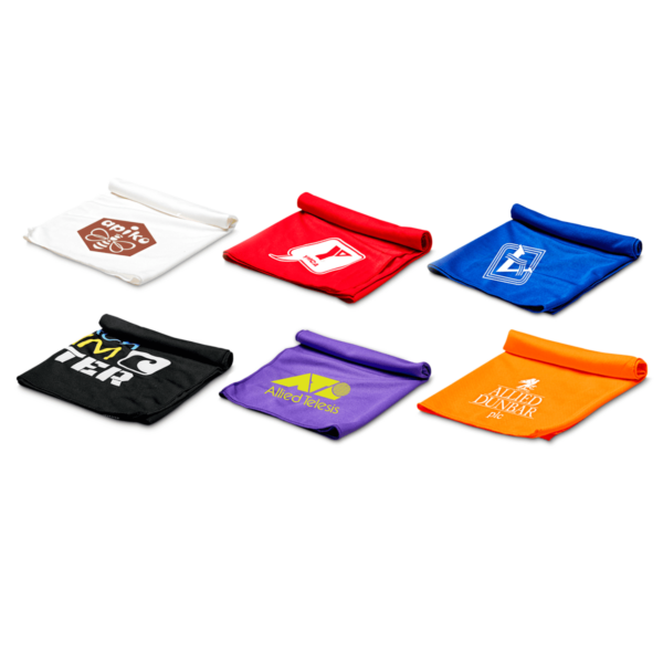 Six rolled-up towels are displayed in two rows. Each towel is a different color: white, red, blue, black, purple, and orange. They feature various logos and text designs on them.