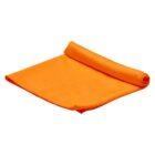 An orange yoga mat partially rolled up on a white background.