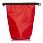 A red waterproof dry bag with a black roll-top closure and clip, used for outdoor or water-sport activities to keep contents dry. The bag is standing upright against a white background.