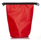 A large red dry bag with a black roll-top closure and buckle is shown. The bag is standing upright against a white background, displaying its smooth, waterproof surface.
