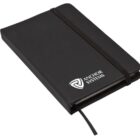 A closed black notebook with a black elastic band and bookmark ribbon. The front cover features the ANCHOR SYSTEMS logo in white at the bottom right corner.
