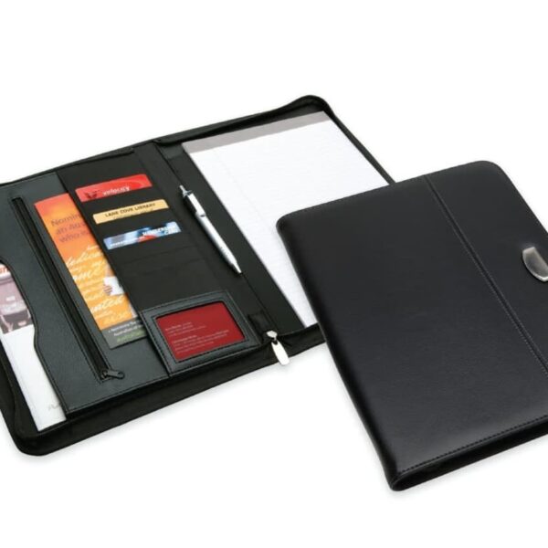 Open black leather portfolio with various compartments, containing a notepad, pen, folders, and business cards. The portfolio is partially closed, and the brand logo is visible on the cover.