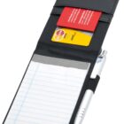 A small black leather notepad holder with a lined notepad and a pen. Inside, there are two card slots holding a red and a yellow card. The pen is silver and black, secured in an elastic loop on the side.