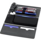 An organized office stationery holder containing pens, a USB cable, earbuds, and business cards. Items are neatly arranged in separate compartments on a dark, foldable case.