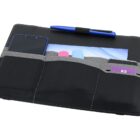 A black leather organizer with three pockets. It holds a blue smartphone, colorful pens, and credit cards. A blue pen is clipped on top. The background is white.