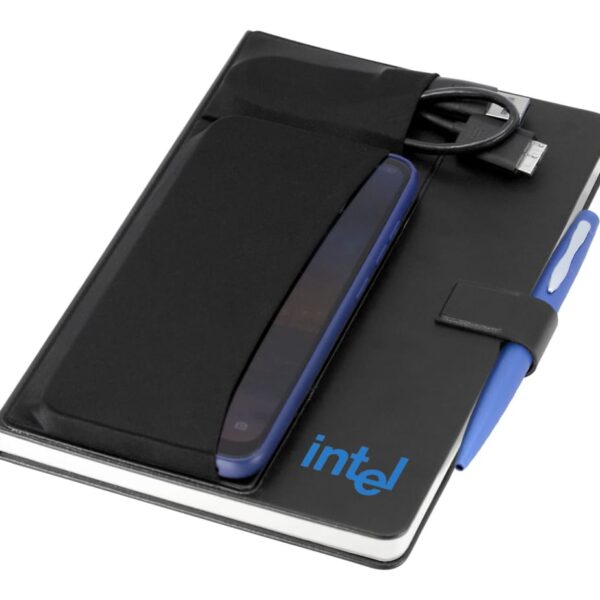 A black notebook with the Intel logo on the cover, featuring a pen holder with a blue pen, an attached pocket containing a smartphone, and a USB charging cable.
