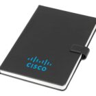 A black notebook with a magnetic clasp, featuring the Cisco logo in blue on the cover.
