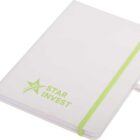 A white notebook with rounded corners, featuring a green elastic band and ribbon bookmark. The cover has a green Star Invest logo with a stylized star.