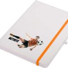 A white notebook with an orange elastic band. The cover features an image of a soccer player in action next to a soccer ball with the word ACTIFIT underneath.