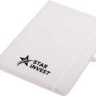 A white notebook with the words Star Invest and a star logo on the cover. The notebook has an elastic band and a ribbon bookmark.